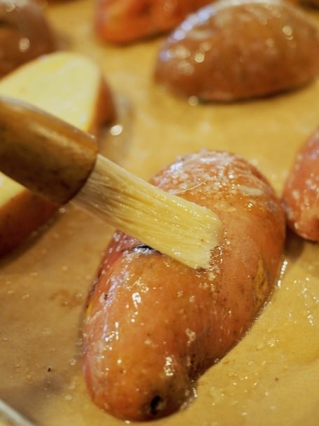 BRUSHING BUTTER ON Roasted Rosemary Red Potatoes