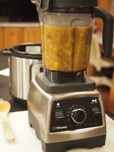 Potato leek soup in Vitamix Blender ready to blend and heat until silky smooth.