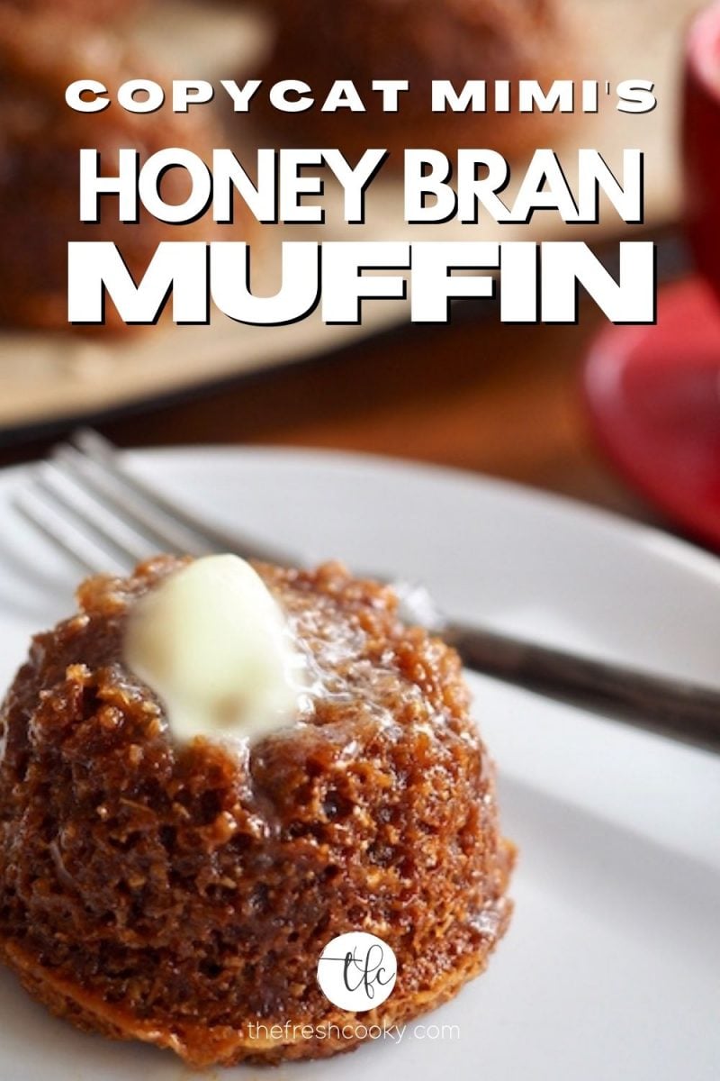 Image of honey bran muffin on plate with fork with pat of melting butter and more muffins behind.