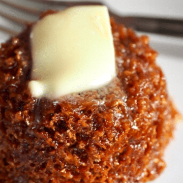 Mimi's Copycat Honey Bran Muffin on plate with fork and pat of butter melting on top of warm muffin.