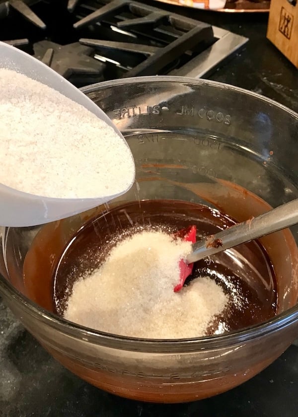 pouring all-natural sugar into chocolate mixture | www.thefreshcooky.com