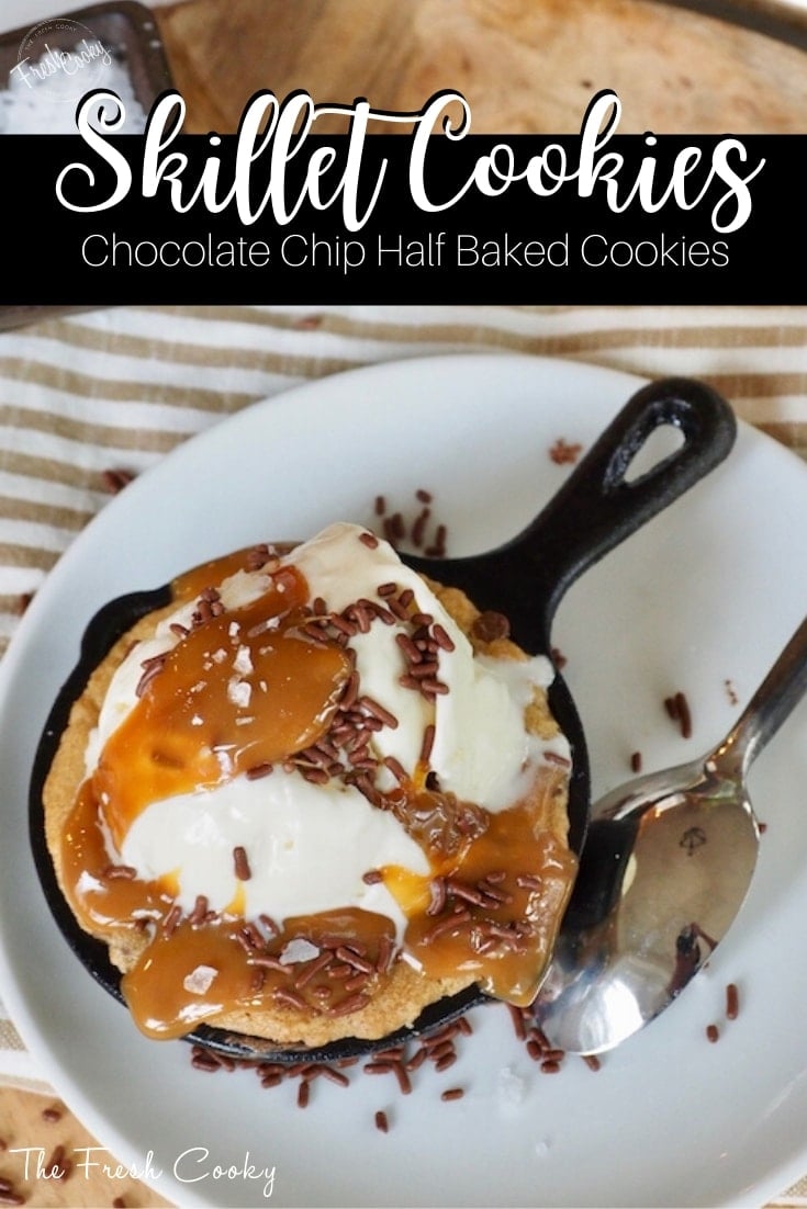 Pin for best half baked mini skillet cookies with image of cookie in cast iron skillet filled with scoop of vanilla ice cream, caramel sauce and chocolate jimmies. 