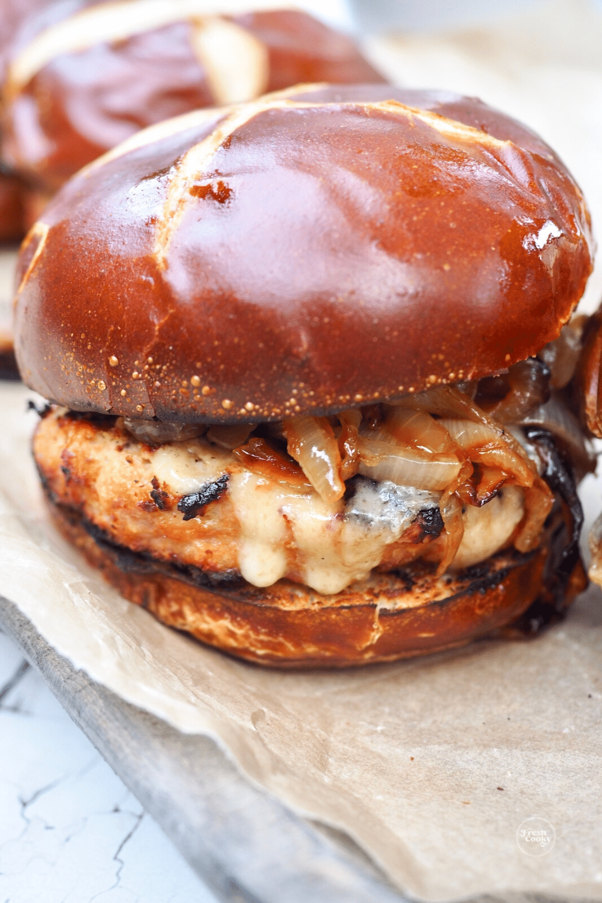 Turkey burger slathered with grilled onions.