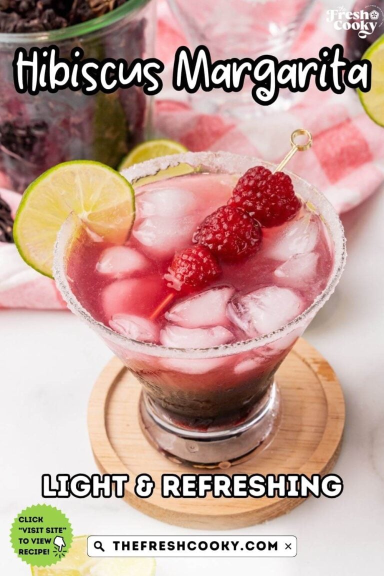 Looking down on a rimmed glass filled with bright red Hibiscus Jamaica Margarita, to pin.