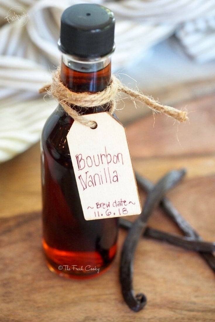 bottle of bourbon vanilla extract with homemade tag | www.thefreshcooky.com