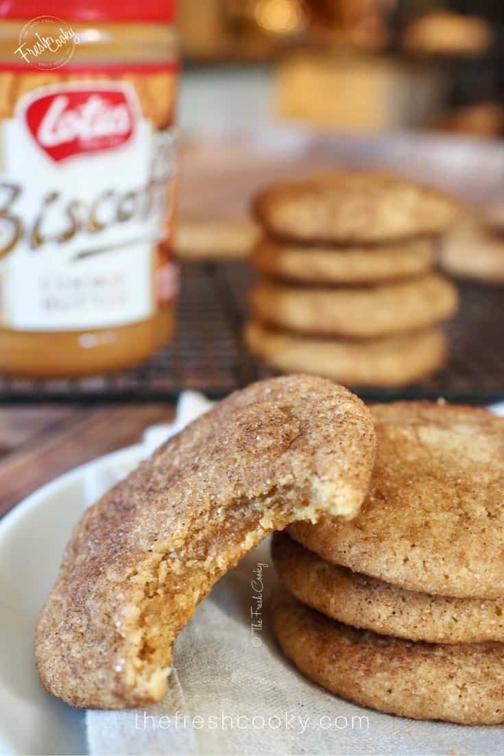 Chewy Cookie Butter Snickerdoodle Cookie with giant bite taken | thefreshcooky.com
