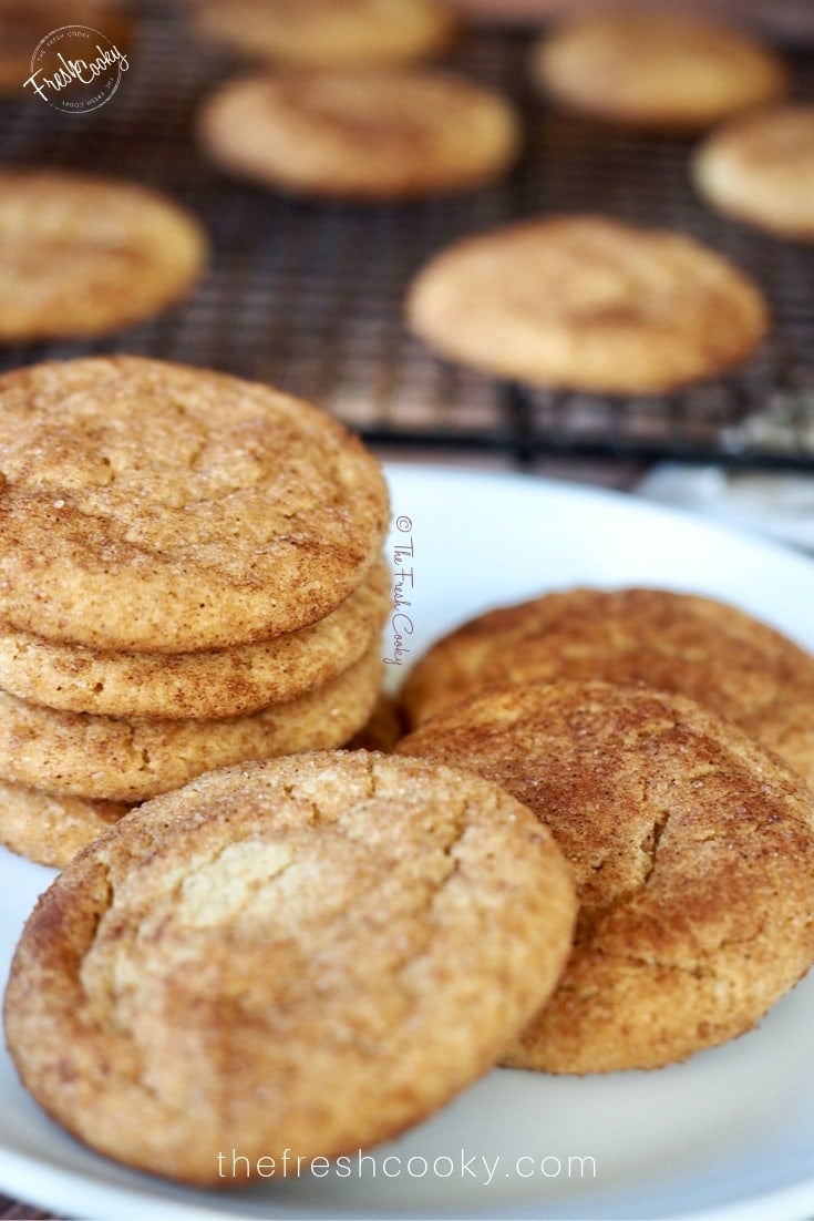 Stack of Cookie Butter Snickerdoodles on plate with cookies in background | thefreshcooky.com