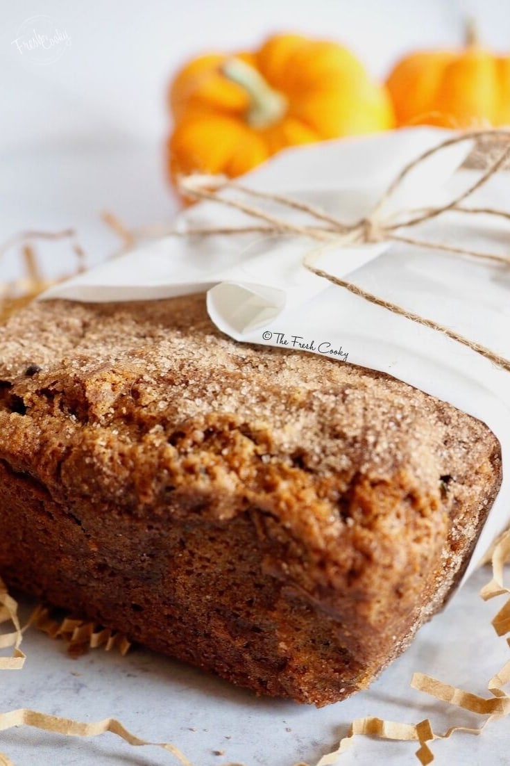 wrapped loaf of healthier snickerdoodle zucchini bread.