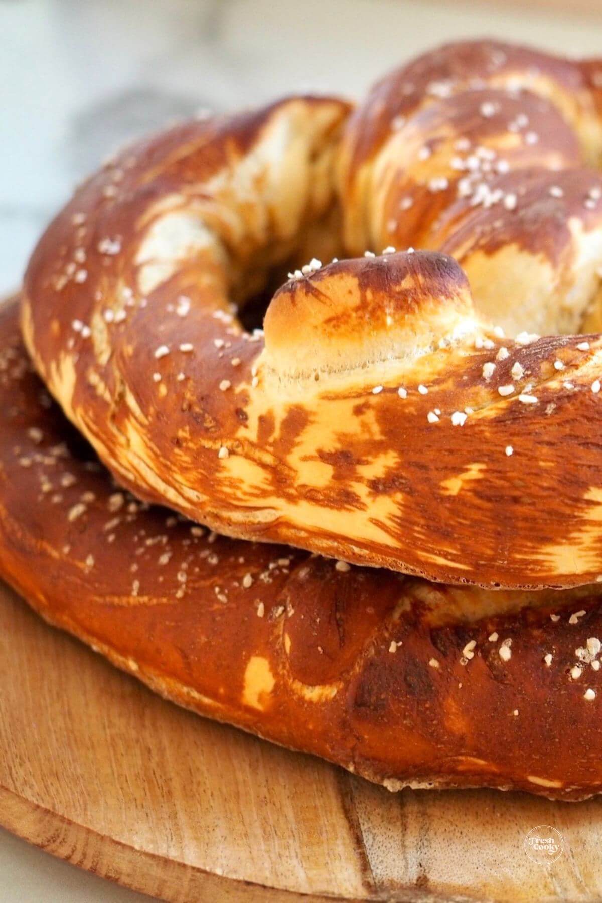 Close up of two large German pretzels.