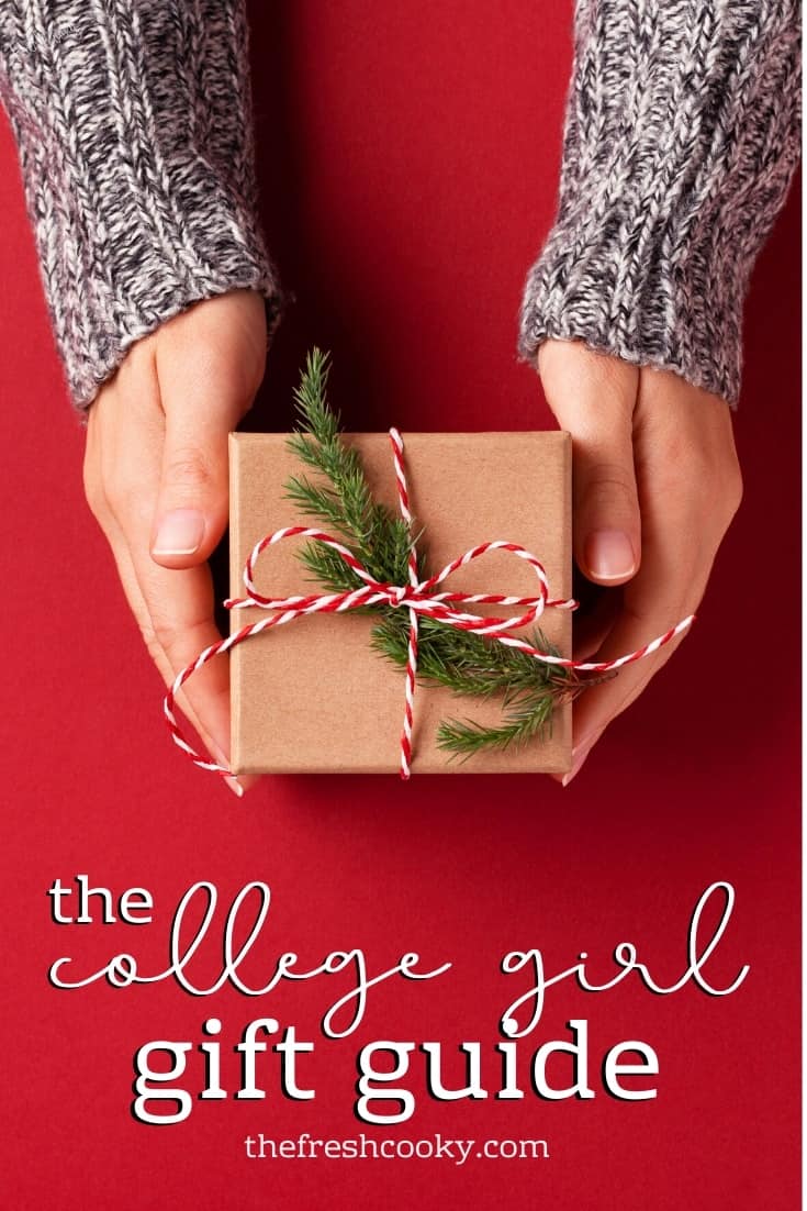 hands with a gift Pin for the College Girl Gift Guide. 