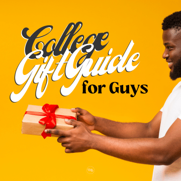 African American man holding a Christmas gift, college gift guide for guys.
