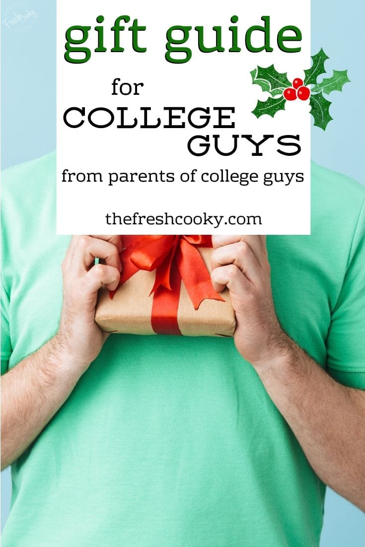 Image of man holding a wrapped package, gift guide for college guys.