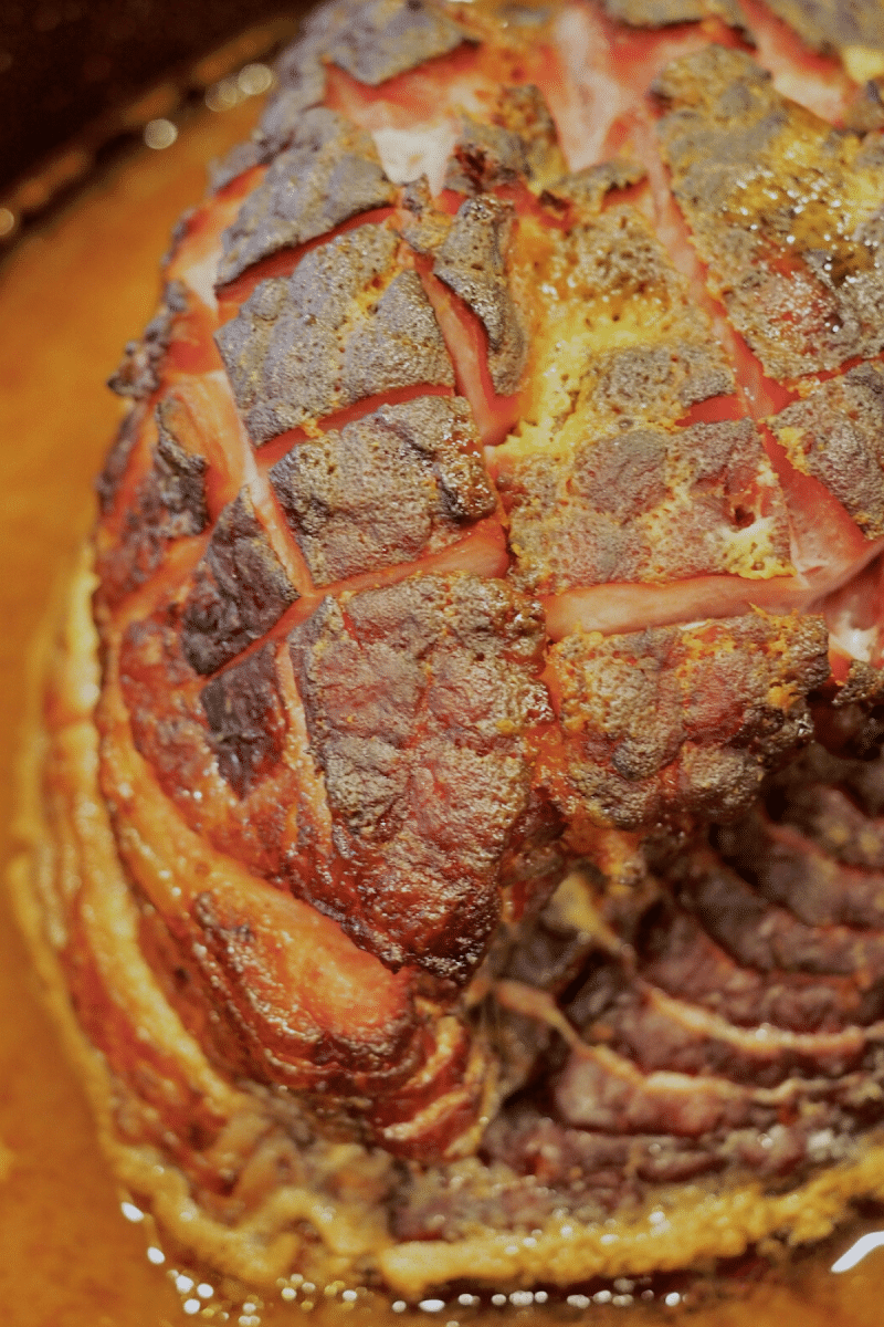 Ham out of the oven with baked in glaze and flavor.