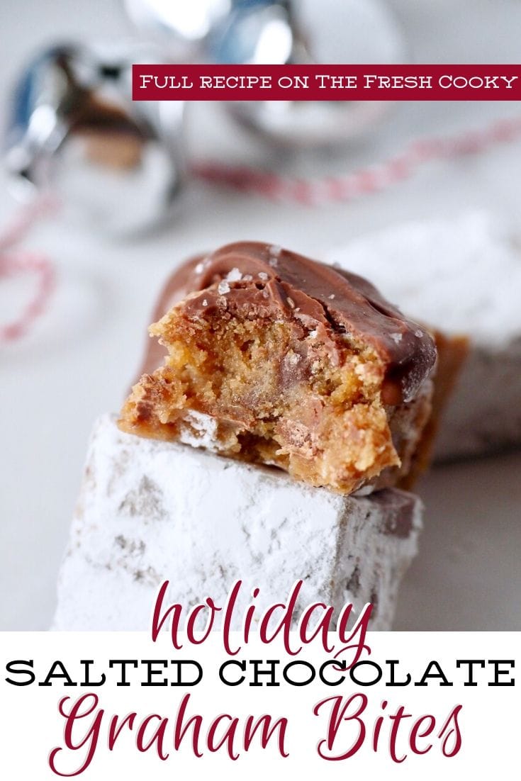 Pinterest image for holiday salted chocolate graham bites with bite taken out of chocolate covered graham cookie. 