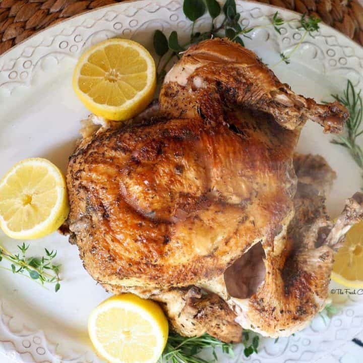 Instant Pot Roasted Whole Chicken with lemons and fresh herbs | thefreshcooky.com