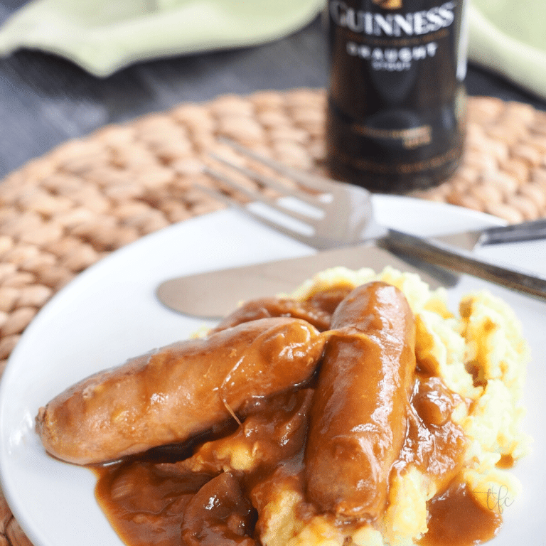 Bangers and mash - sausages and mashed potatoes with yummy stout onion gravy.