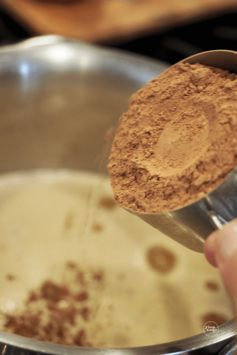 Whisking in cocoa powder to butter and beer mixture. 