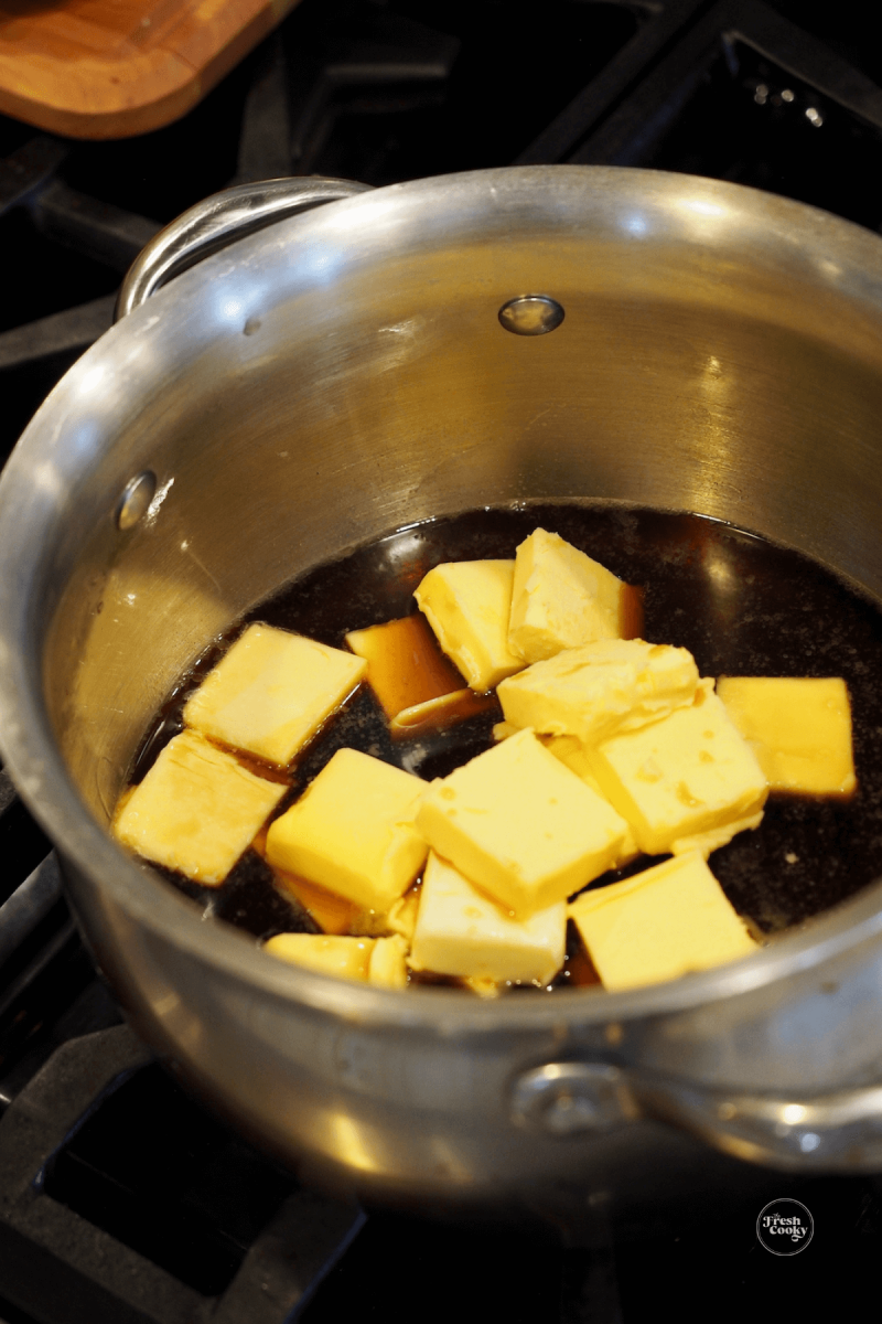 Melt butter in pot along with Guinness.