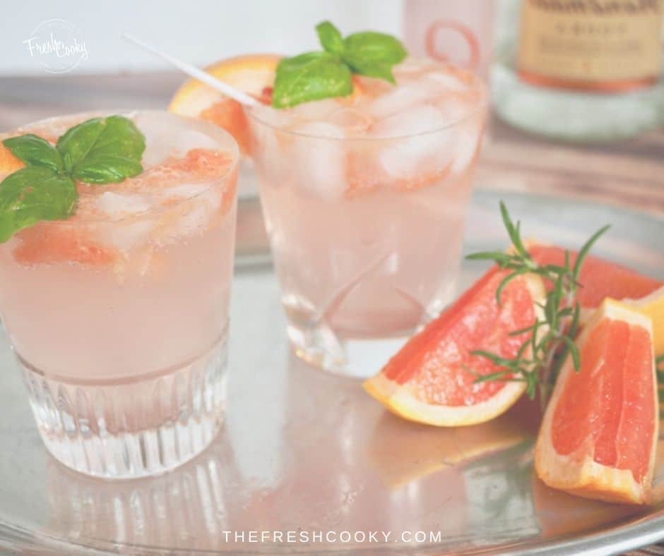 Beautiful Grapefruit Basil Vodka Smash drink on a silver tray. 