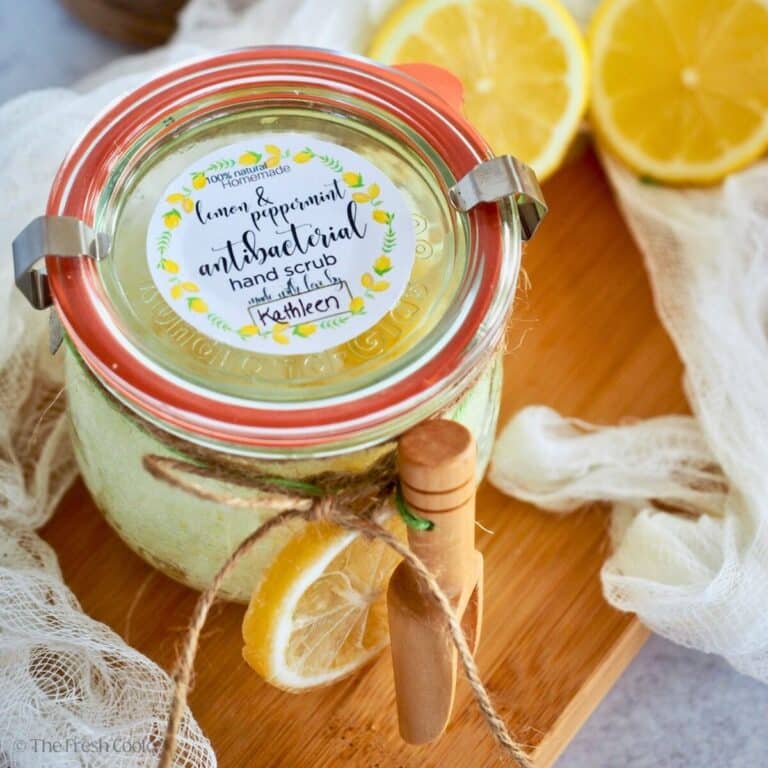 Lemon label afixed to the top of a jar of lemon antibacterial hand scrub.