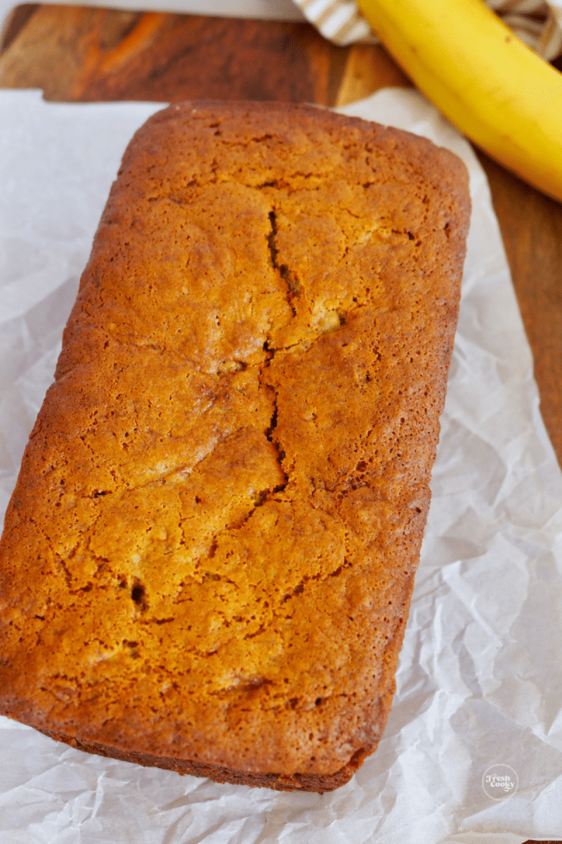Full loaf unsliced, of banana bread recipe made at high altitude.