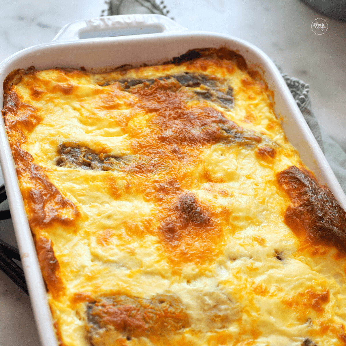 Chile relleno casserole recipe in Staub baking dish.