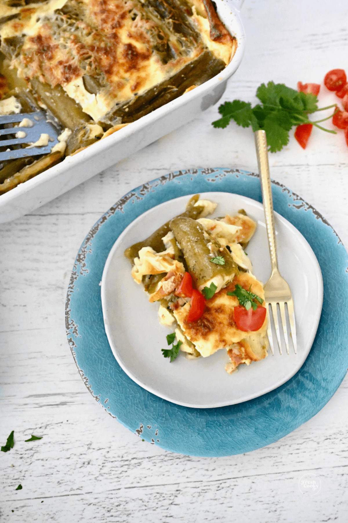 Chile relleno casserole in pan and serving on plate.