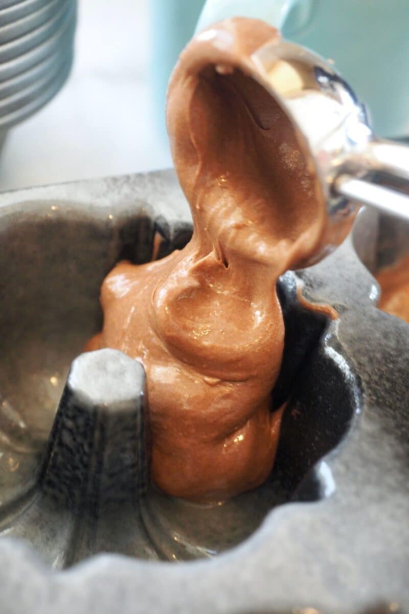 Scooping batter into bundlet pans.
