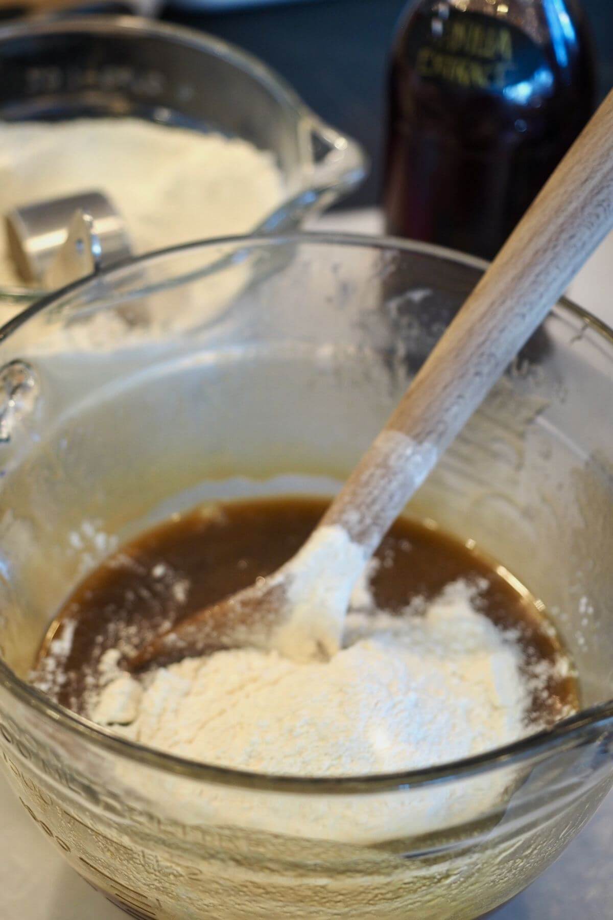 Add flour mixture into wet ingredients for blondies. 