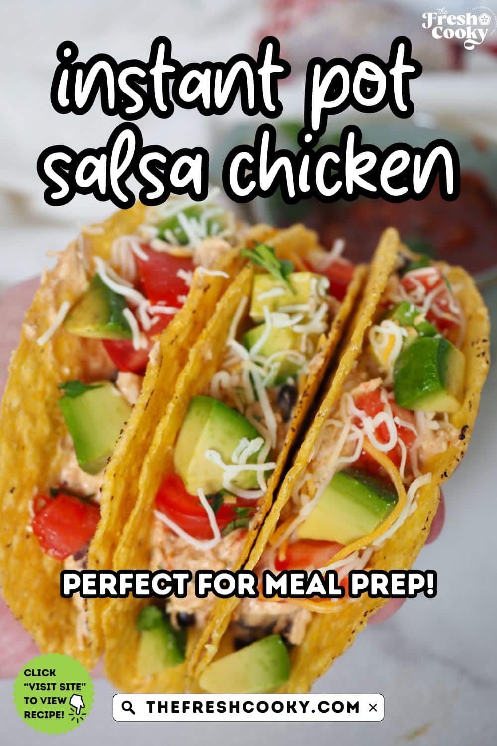 Hand holding three salsa chicken tacos made in the Instant Pot for pinning.