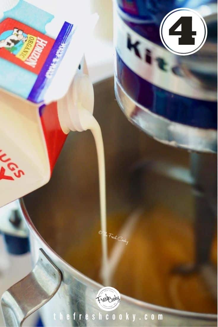 pouring a carton of half and half into mixing bowl of stand mixer