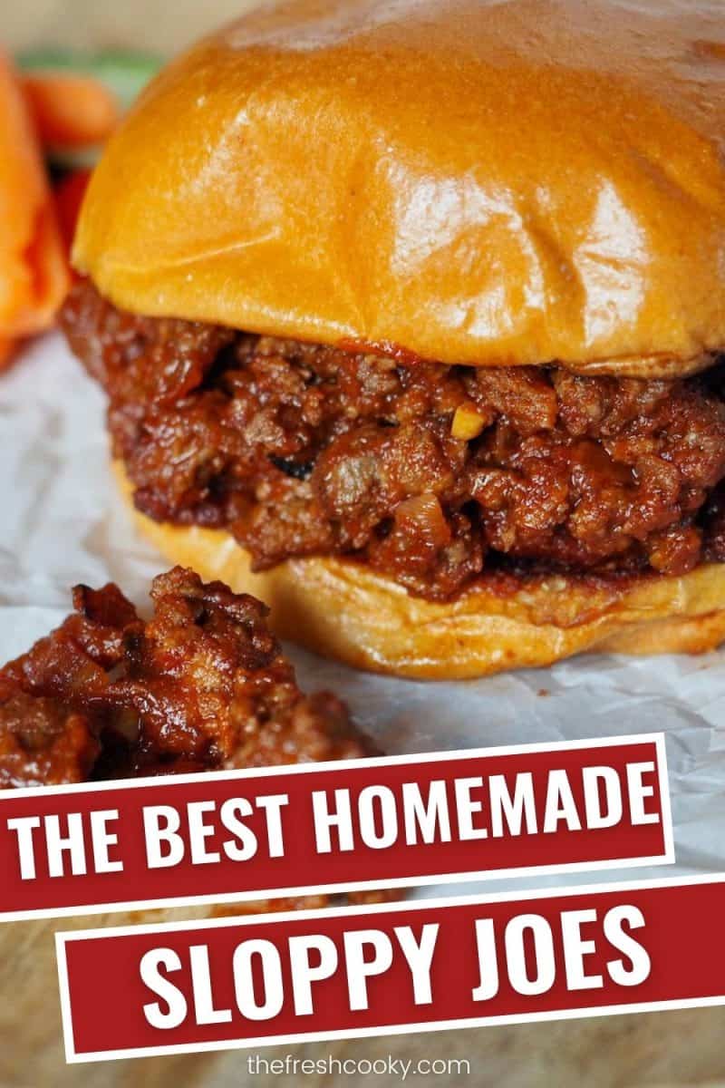 Pinterest image of closeup of sloppy joe burger or sandwich filled with sloppy joe mixture some spilling onto white parchment paper with type saying The Best Homemade Sloppy Joes