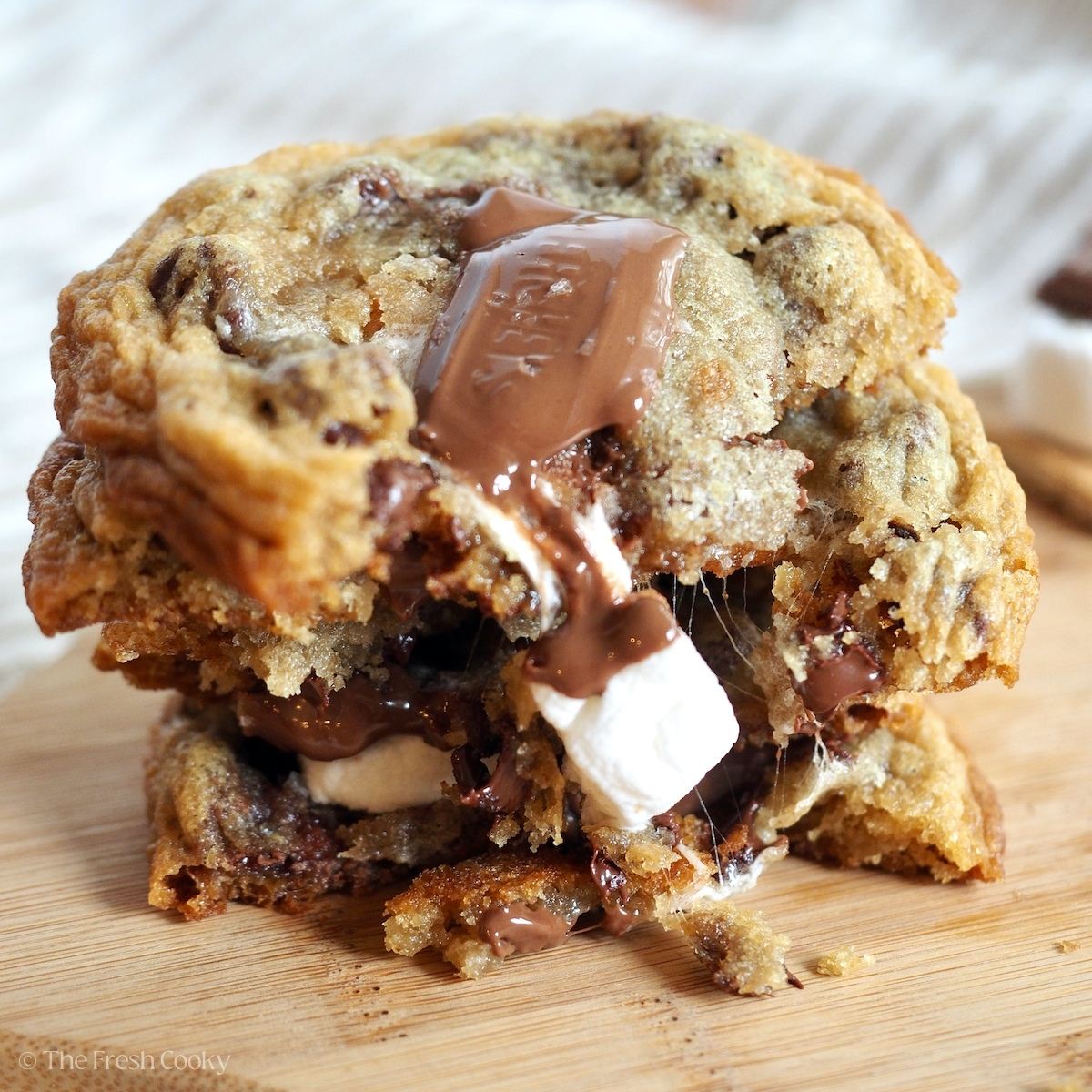 S'more Cookies close-up with Hershey bar on top and mini marshmallow.