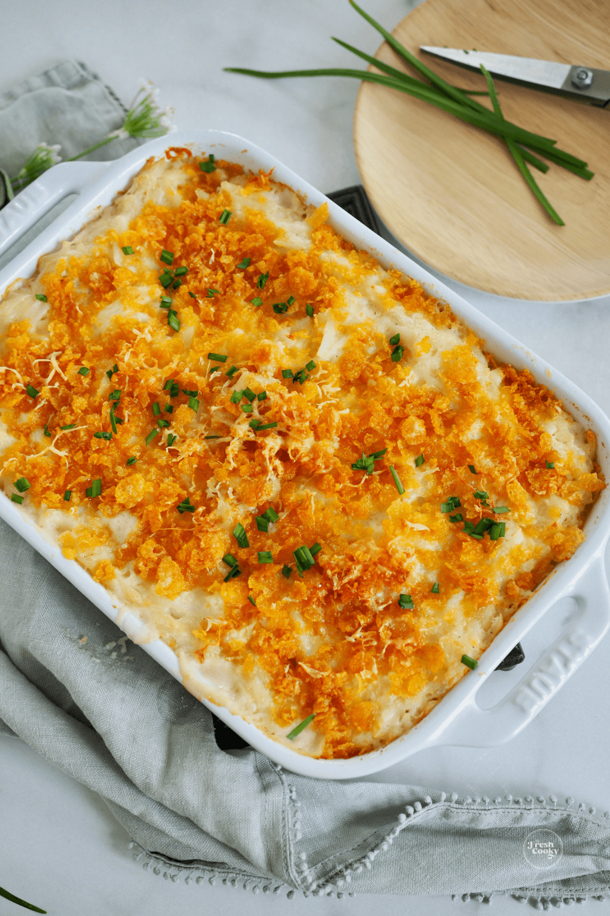 Hashbrown casserole recipe with corn flakes, baked and ready to serve.