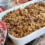 How from the oven, a serving dish with apple crisp.