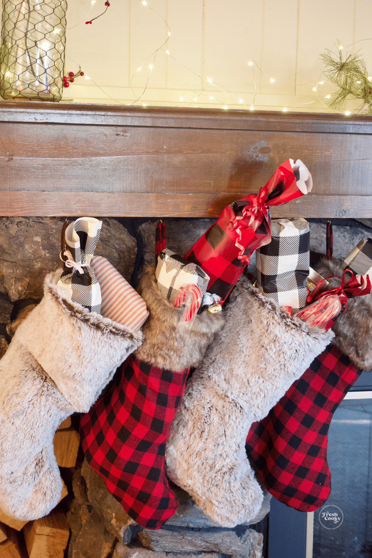 Stockings hung on the mantle, stuffed full of stocking stuffers.