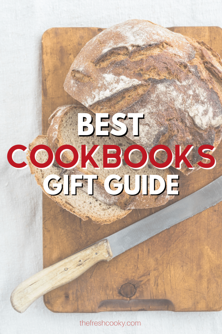 Sliced rustic bread on cutting board with words best cookbooks gift guide. 