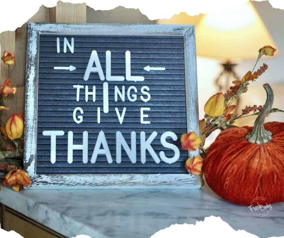 Fall Letter board with words In ALL things give Thanks with a velvet pumpkin and fall leaves