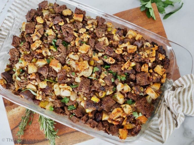 Sausage dressing in a glass baking dish.