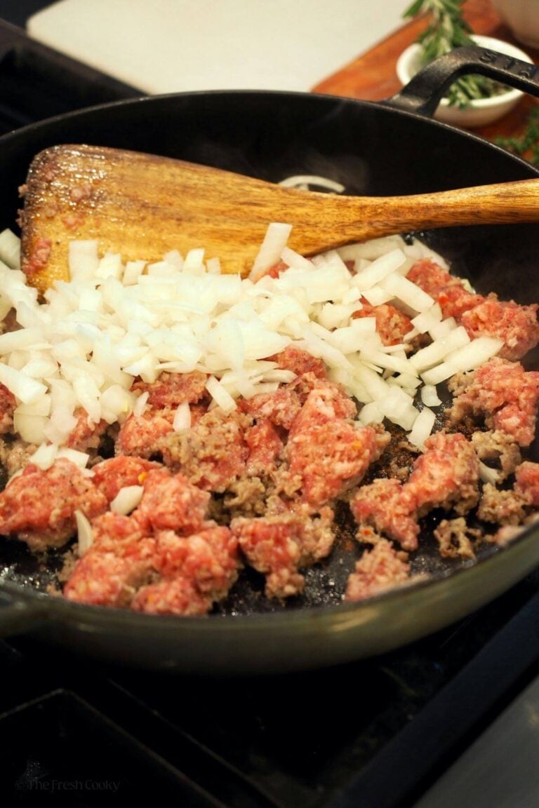 Browning breakfast sausage with onions for stuffing.