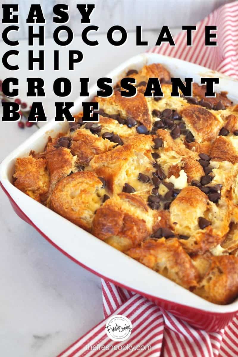 Pinterest Image for Easy Chocolate Chip Croissant Bake with casserole in background, chocolate chip croissant bake on red and white striped tea towel.