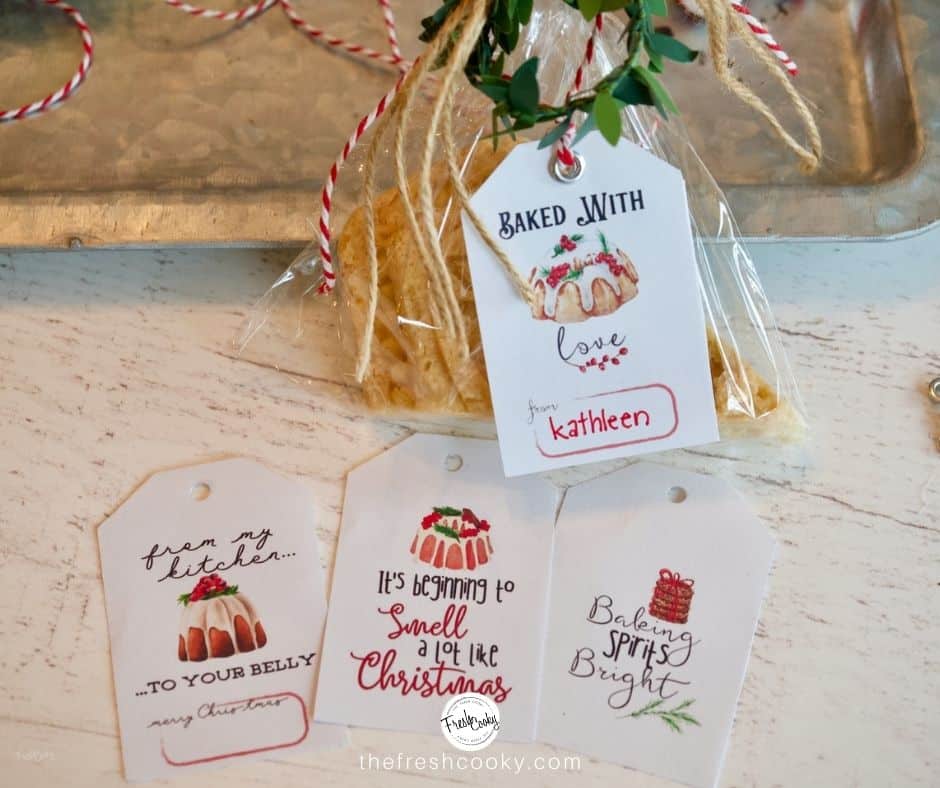 Facebook image of 4 different labels that can be used on baked goods, from the kitchen of, smells a lot like Christmas, free printable gift tags.