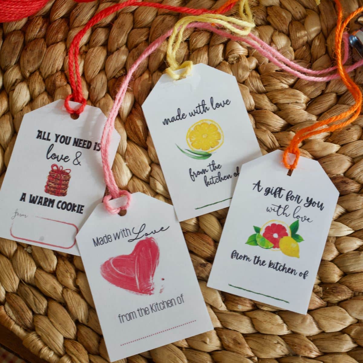 Four designs for from the kitchen of gift labels; made with love from the kitchen of, all you need is love and a warm cookie.