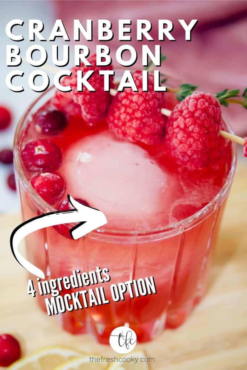 Pinterest image for Cranberry Bourbon Sour crystal glass filled with bright reddish pink cocktail, garnished with frozen raspberries, cranberries and a sprig of thyme. Low sugar and Mocktail option