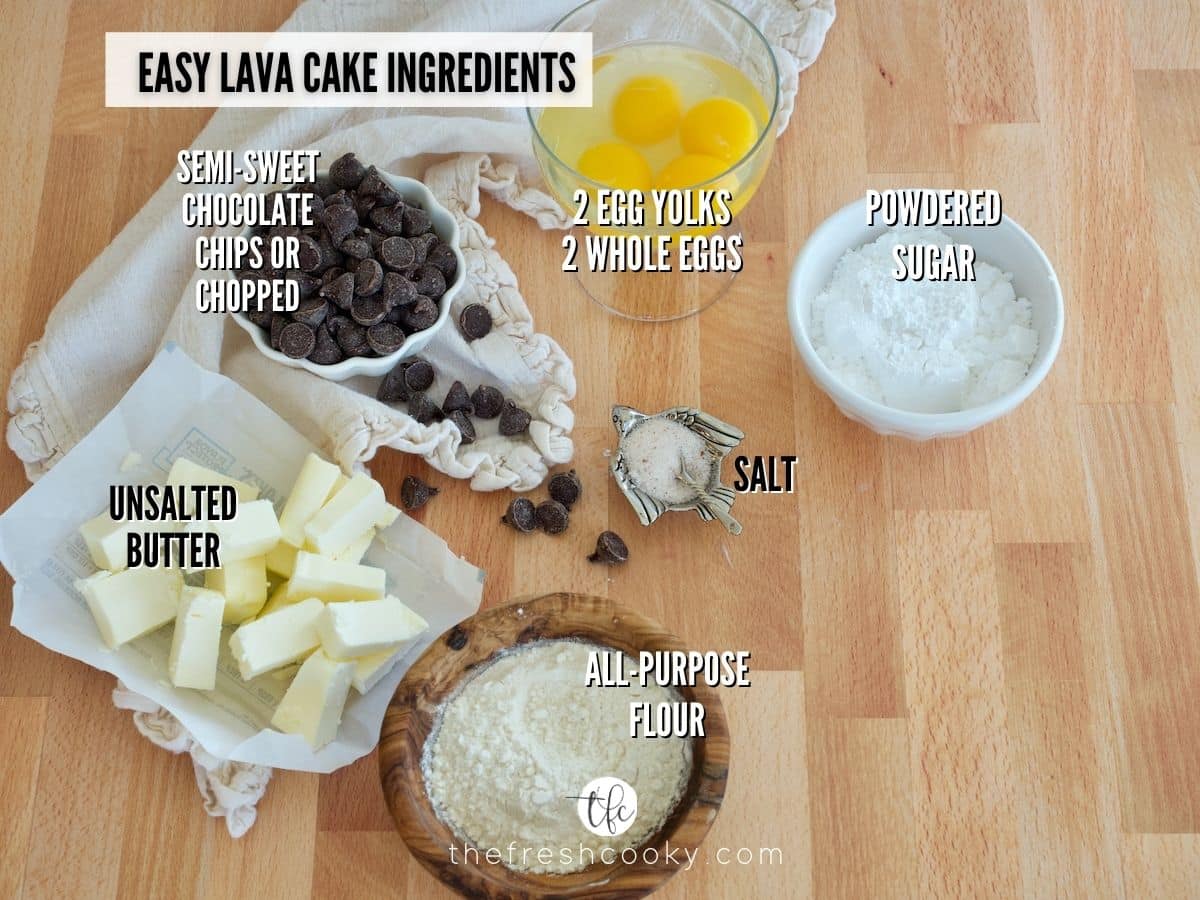 image of easy lava cake recipe ingredients. L-R unsalted butter, chocolate chips, eggs, powdered sugar, salt and all purpose flour.