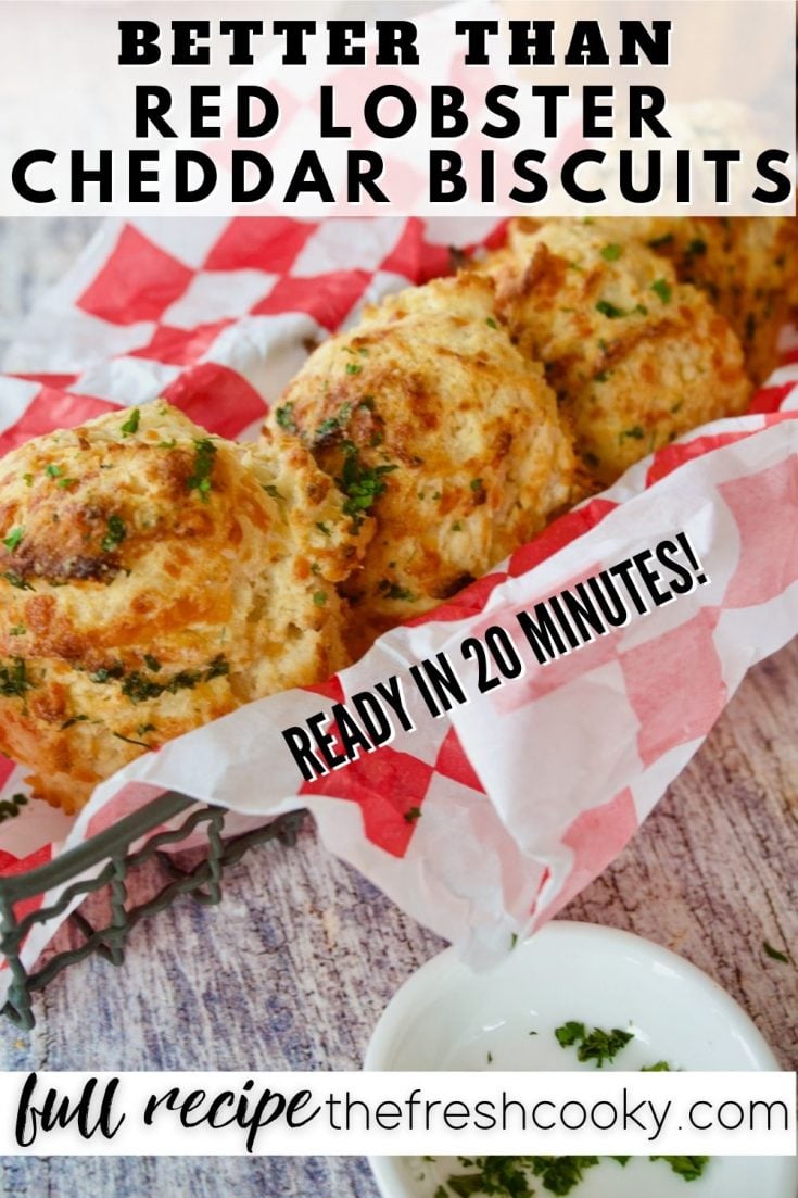 Pin for Better than Red Lobster Cheddar Biscuits with basket of tender, hot biscuits.