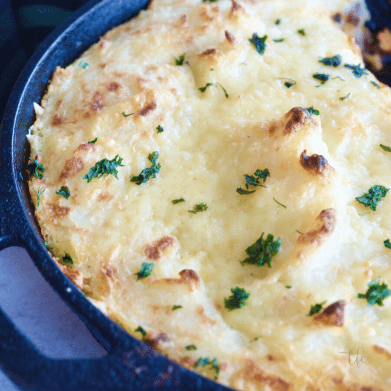 Skillet shepherd's pie square image with golden brown mashed potatoes.