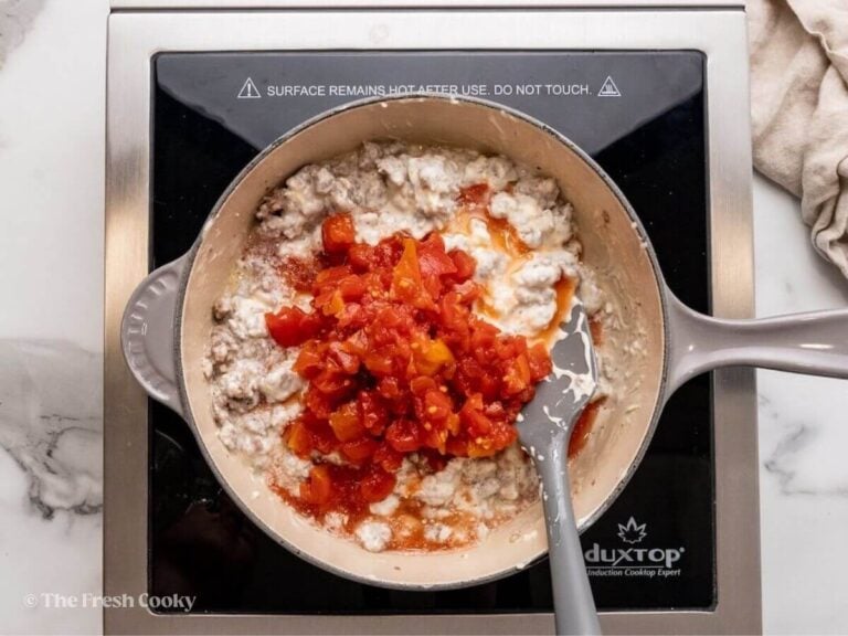 Add Rotel tomatoes and mix in.