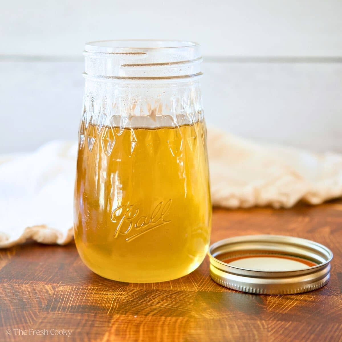 Homemade Simple Syrup in a jar with a lid.