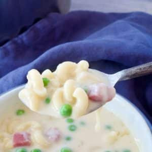 Spoonful of mac and cheese soup, using leftover ham.